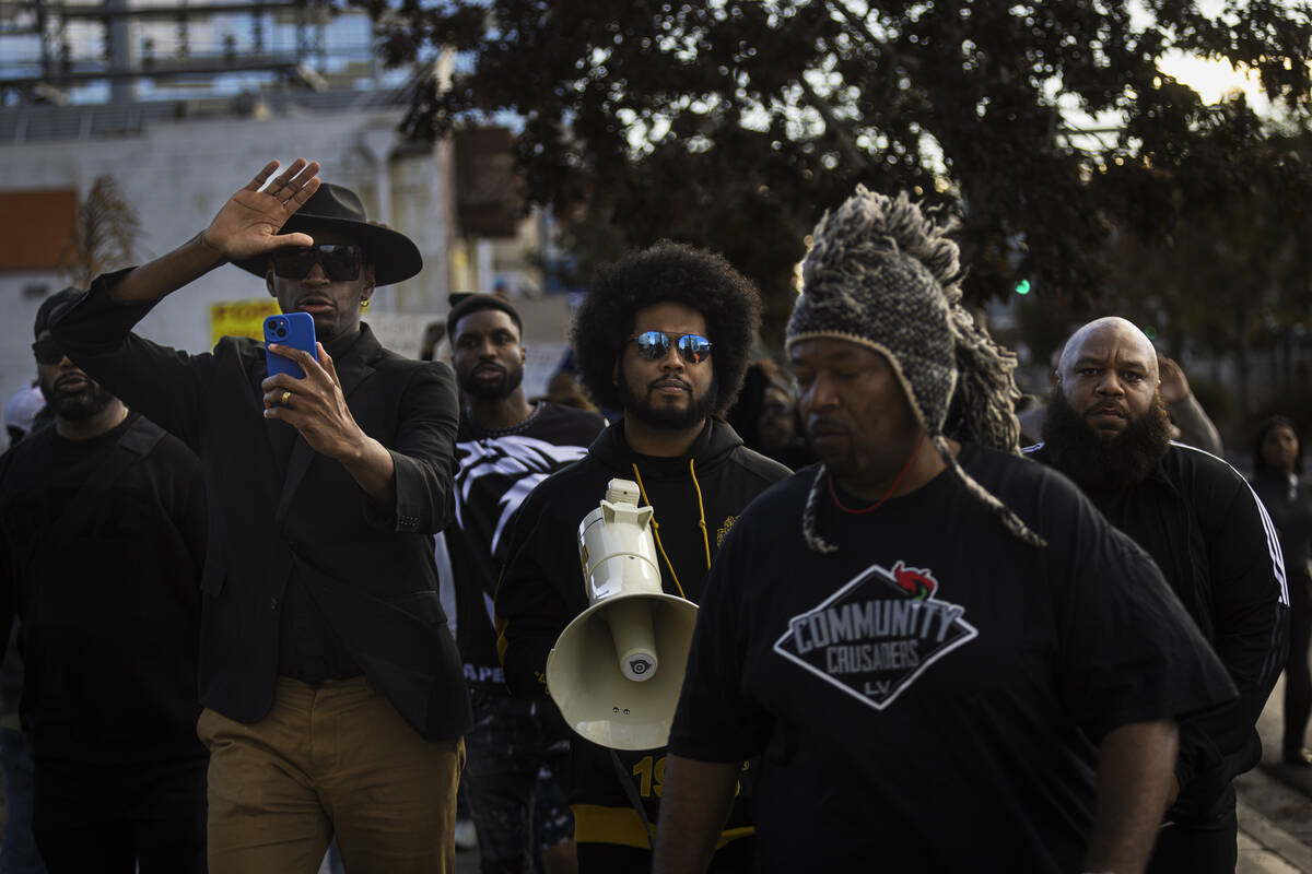 Minister Vance “Stretch” Sanders, left and Quentin Savwoir, president of the NAAC ...