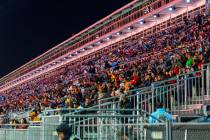 Fans watch the race from the main grandstand during the third practice round for the Formula 1 ...