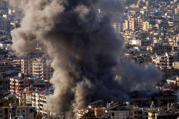 Smoke rises after an Israeli airstrike on Dahiyeh, in the southern suburb of Beirut, Lebanon, S ...