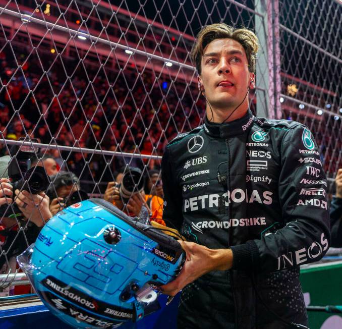 Mercedes driver George Russell readies to race as teams assemble on the track during the Formul ...