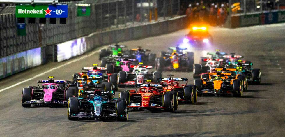 Mercedes driver George Russell leads the pack at the start of the race during the Formula 1 Las ...