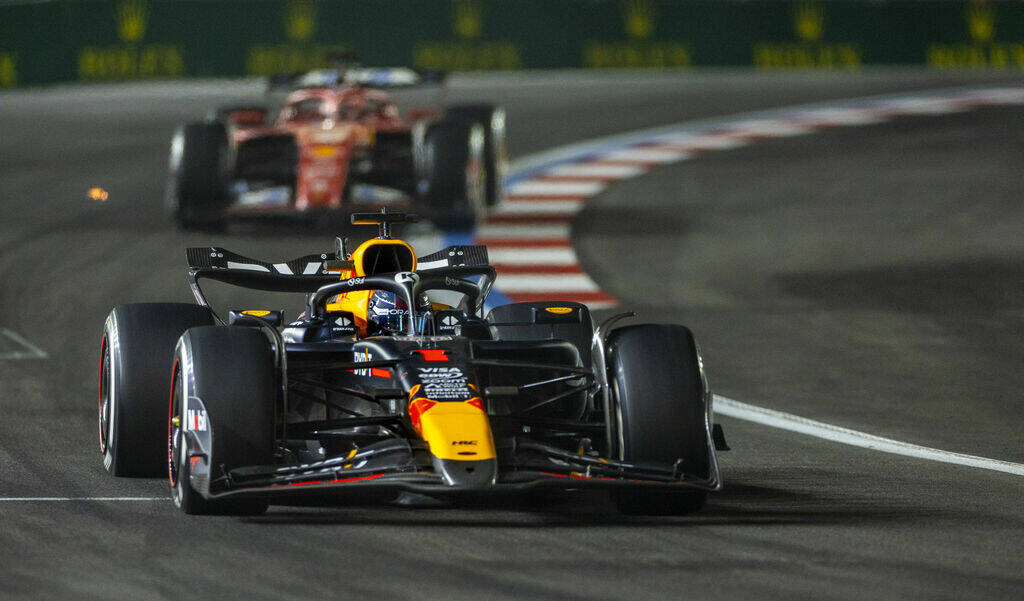 Red Bull Racing driver Max Verstappen navigates the final turn on the track during the Formula ...