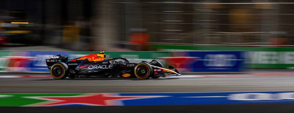 Red Bull Racing driver Max Verstappen navigates the first turn on the track during the Formula ...