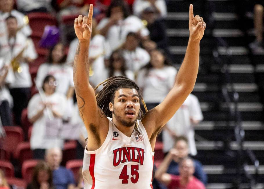 UNLV forward Jeremiah Cherry (45) celebrates a play during the college basketball game against ...