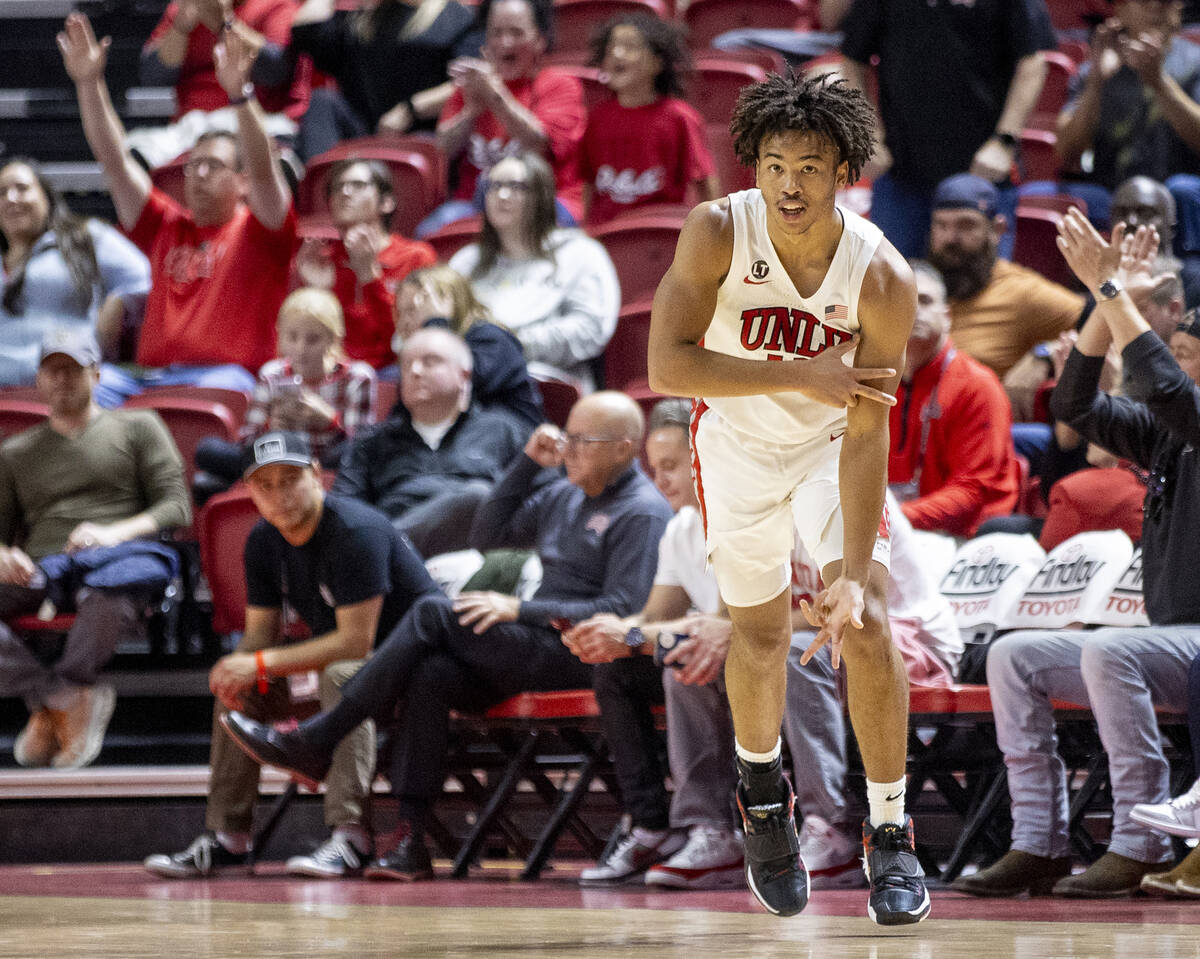 UNLV guard Dedan Thomas Jr. (11) celebrates after scoring a three-pointer during the college ba ...