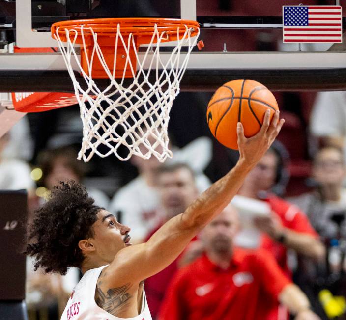 UNLV guard Brooklyn Hicks attempts a layup during the college basketball game against the New M ...