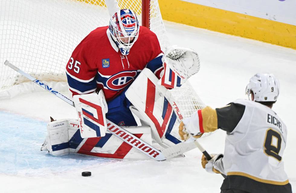 Vegas Golden Knights' Jack Eichel (9) takes a shot on Montreal Canadiens goaltender Sam Montemb ...