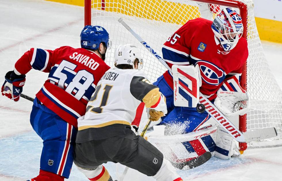 Montreal Canadiens goaltender Sam Montembeault makes a save as Vegas Golden Knights' Brett Howd ...