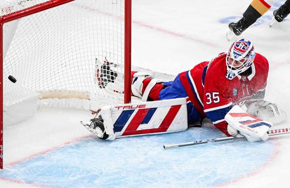 Montreal Canadiens goaltender Sam Montembeault looks back on his net after being scored on by V ...