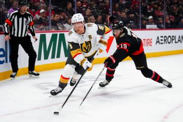 Vegas Golden Knights centre Jack Eichel (9) skates the puck past Ottawa Senators right wing Dra ...