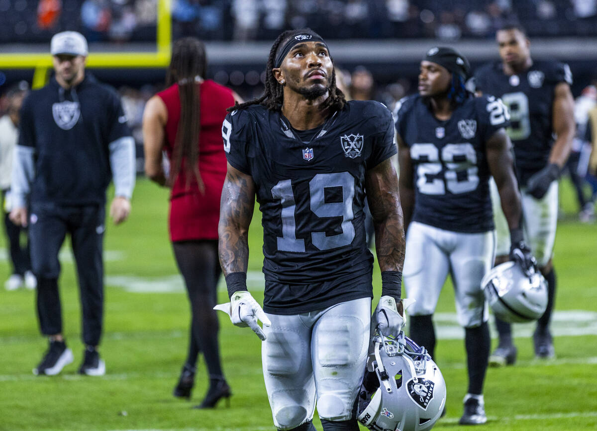 Raiders wide receiver DJ Turner (19) walks off the field after a loss to the Denver Broncos dur ...