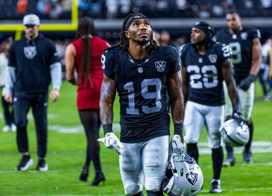 Raiders wide receiver DJ Turner (19) walks off the field after a loss to the Denver Broncos dur ...