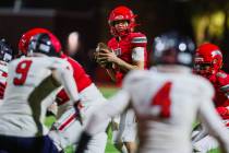 Arbor View quarterback Thaddeus Thatcher (7) looks to throw the ball during a Class 5A Division ...