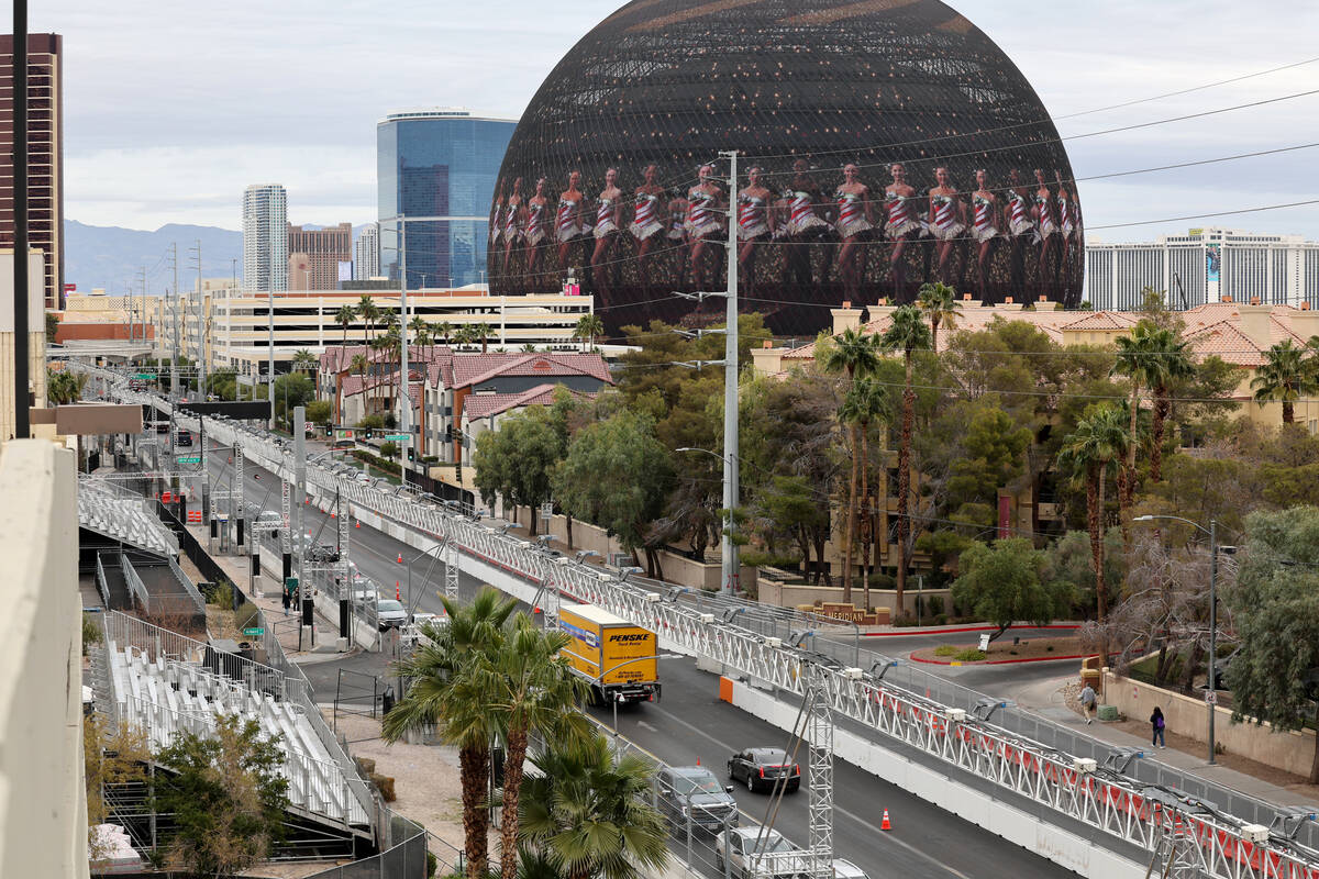 Workers dismantle the Formula One Las Vegas Grand Prix track on Koval Lane near Flamingo Road ...