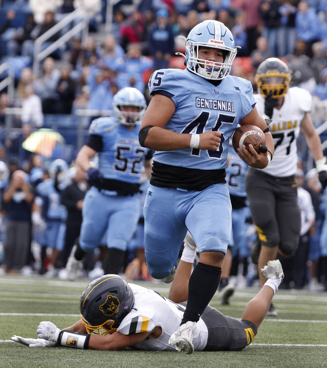 Centennial High's free safety Brayden Hicks (45) runs for a touchdown as Galena High defensive ...