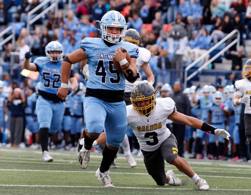 Centennial High's free safety Brayden Hicks (45) runs for a touchdown as Galena High defensive ...