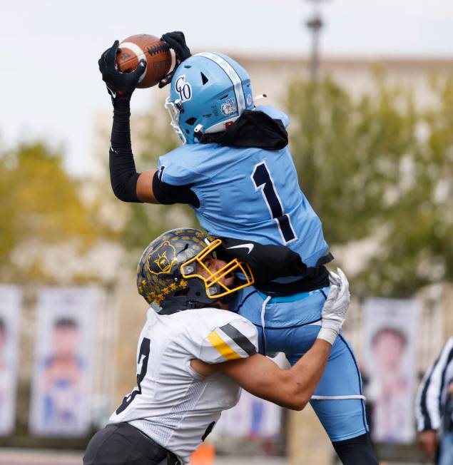 Centennial High's wide receiver Jayden "jet" Thomas (1) catches a pass as Galena High ...