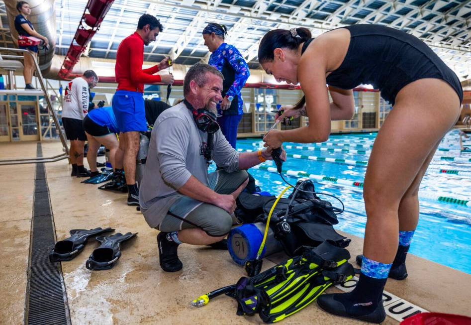 Students get ready to dive during a Sin City Scuba class at the Whitney Ranch Aquatic Center Tu ...