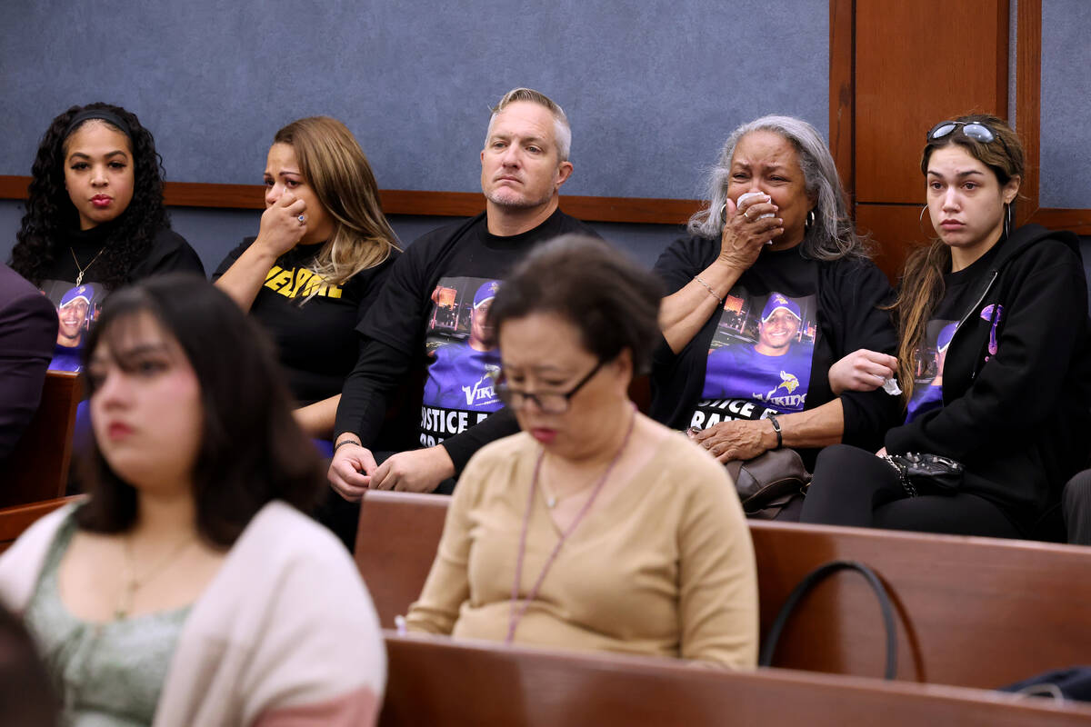 Family members of Brandon Durham, who was shot and killed by police after reporting a home inva ...