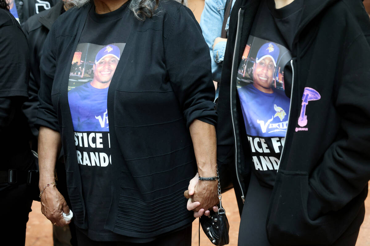 Relatives of Brandon Durham, who was shot and killed by police after reporting a home invasion, ...