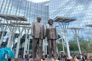 A larger-than-life sculpture of Oscar Goodman and Carolyn Goodman is unveiled at Las Vegas City ...