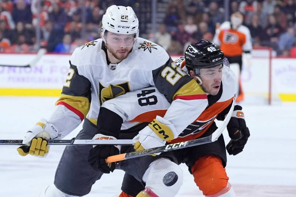 Vegas Golden Knights' Cole Schwindt, left, and Philadelphia Flyers' Morgan Frost chase after th ...