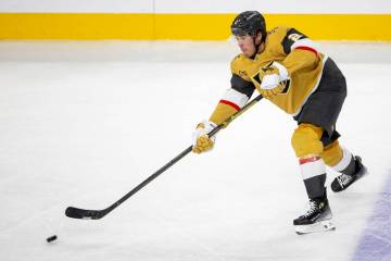 Golden Knights defenseman Zach Whitecloud (2) passes the puck during the third period of the NH ...