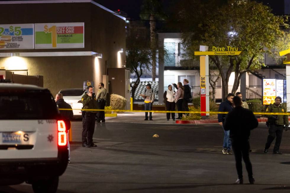 Las Vegas police investigate the scene of a homicide at a McDonald’s on Paradise Road on ...