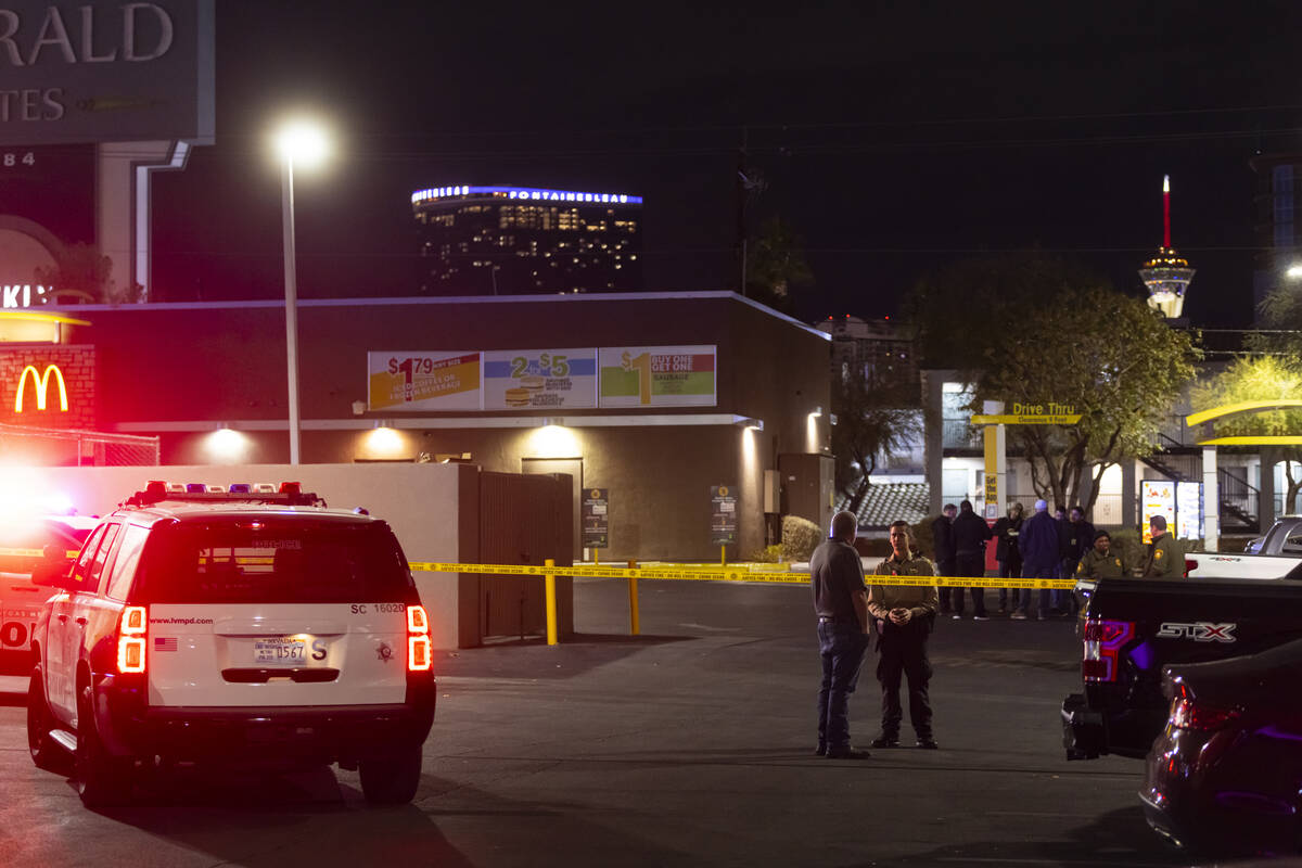 Las Vegas police investigate the scene of a homicide at a McDonald’s on Paradise Road on ...