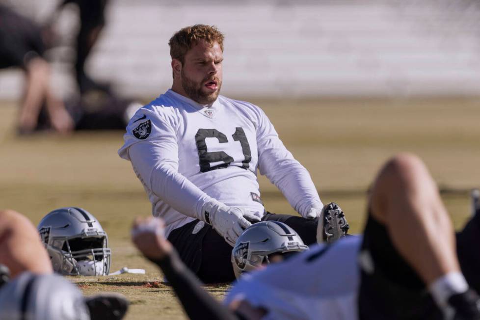 Raiders guard Jordan Meredith (61) stretches during the team’s practice on Wednesday, No ...