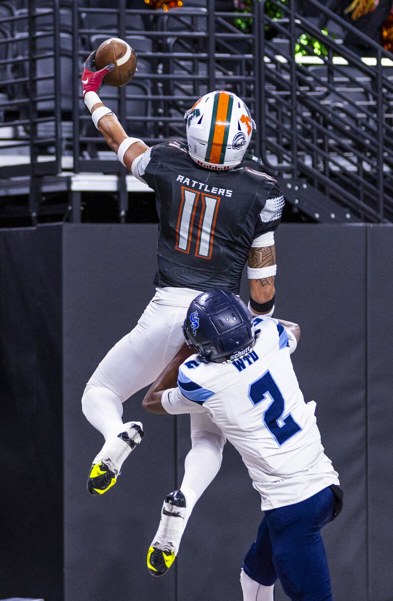 Mojave wide receiver Albert AJ Tuitele (11) makes a great catch out of bound on a two-point con ...