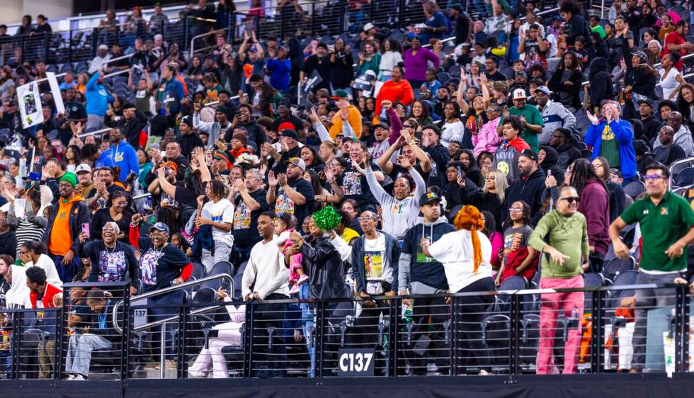 Mojave fans celebrate another score against Canyon Springs during the first half of their Class ...