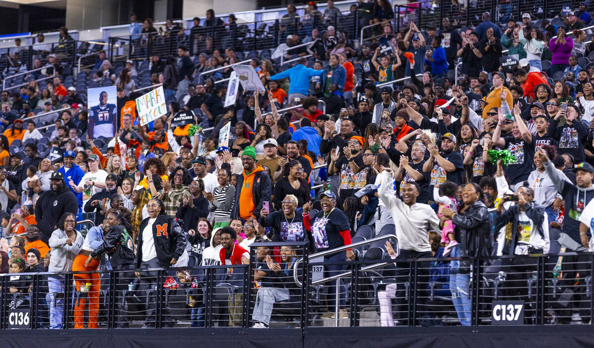 Mojave fans celebrate another score against Canyon Springs during the first half of their Class ...