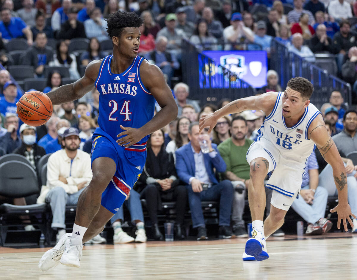 Kansas Jayhawks forward KJ Adams Jr. (24) controls the ball during the Vegas Showdown college b ...