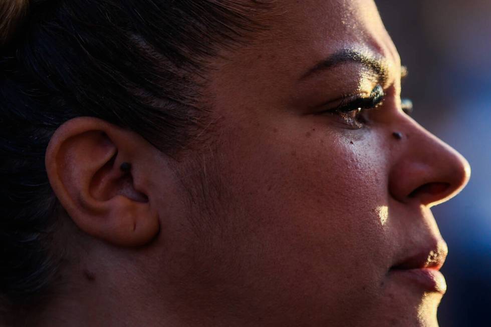 Rachael Gore cries during a vigil for Brandon Durham, who was shot and killed in his home by a ...