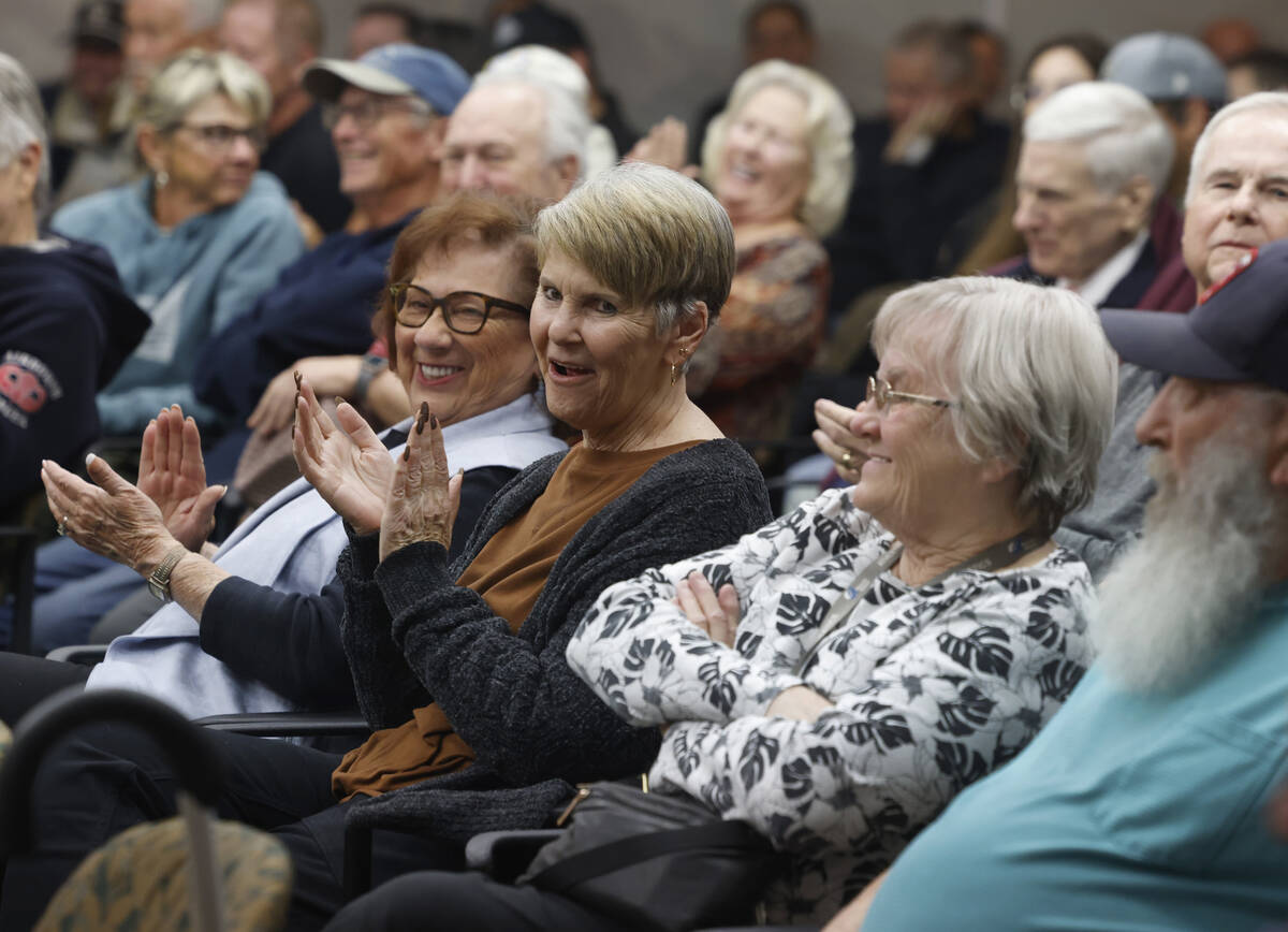 Attendees applaud in support of Mesquite Police Chief MaQuade Chesley during a City Council mee ...