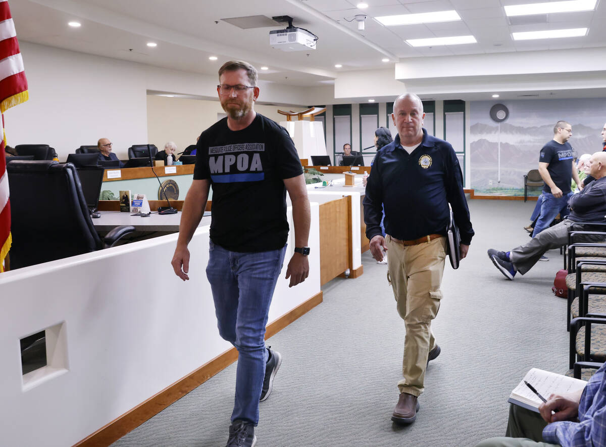 Andrew Regenbaum, right, executive director of the Nevada Association of Public Safety Officers ...