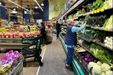 Customers shop at a grocery store in Chicago, Oct. 25, 2024. (AP Photo/Nam Y. Huh, File)