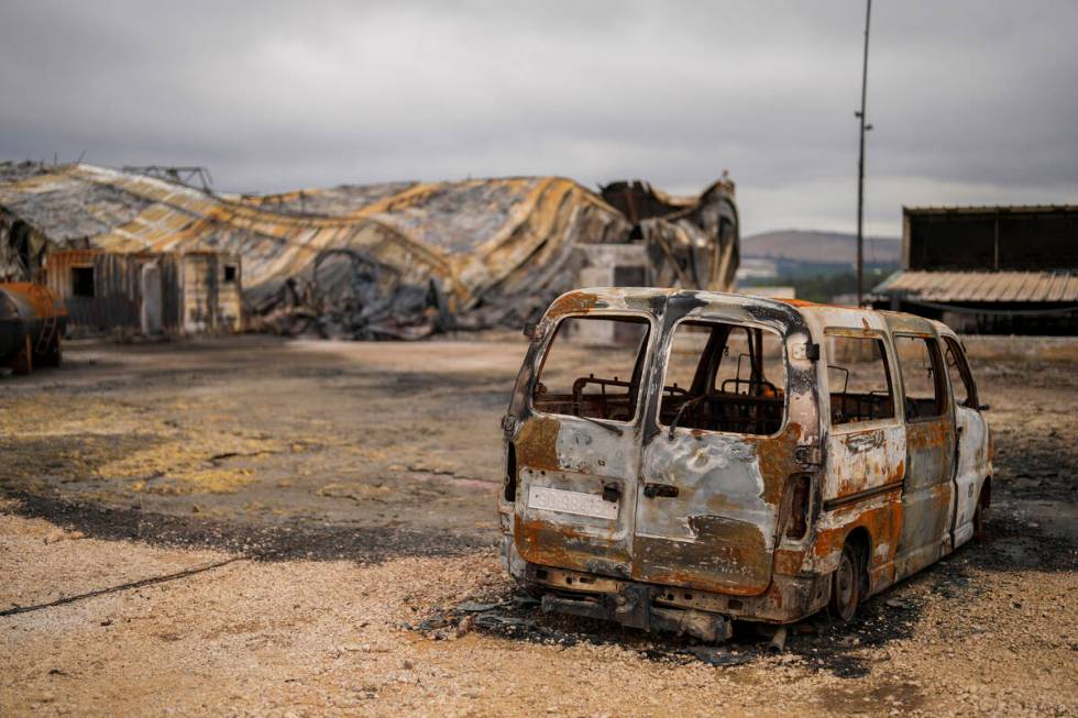 Damage is seen at an animal farm hit by a rocket fired from Lebanon in Avivim, northern Israel, ...