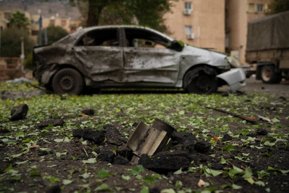 A rocket, fired from Lebanon during the night hours before the start of the ceasefire, sits wed ...