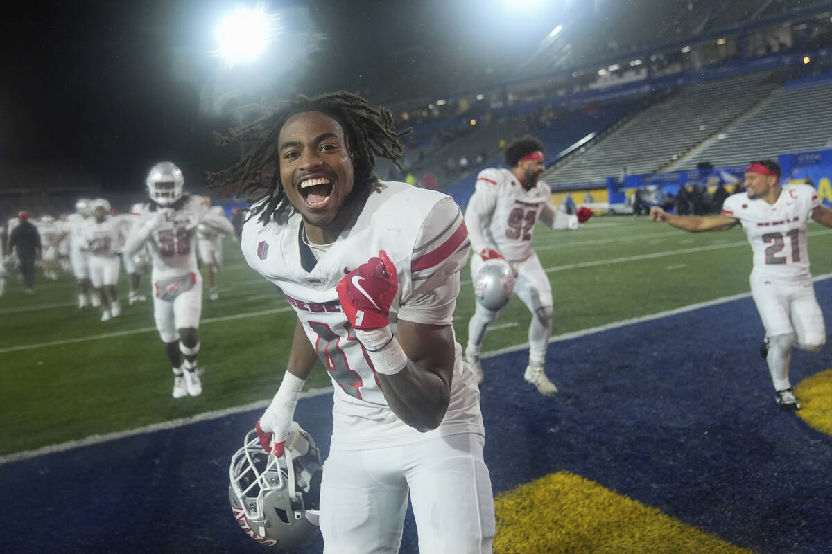 UNLV defensive back Rashod Tanner, center, celebrates after the team's victory over San Jose St ...