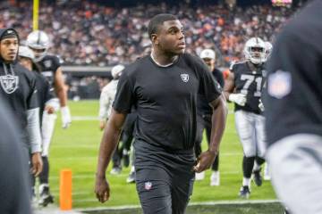 Raiders cornerback Jakorian Bennett (0) walks off the field for halftime of an NFL game against ...