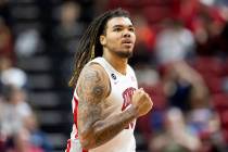 UNLV forward Jeremiah Cherry pumps his fist after a play during the college basketball game aga ...