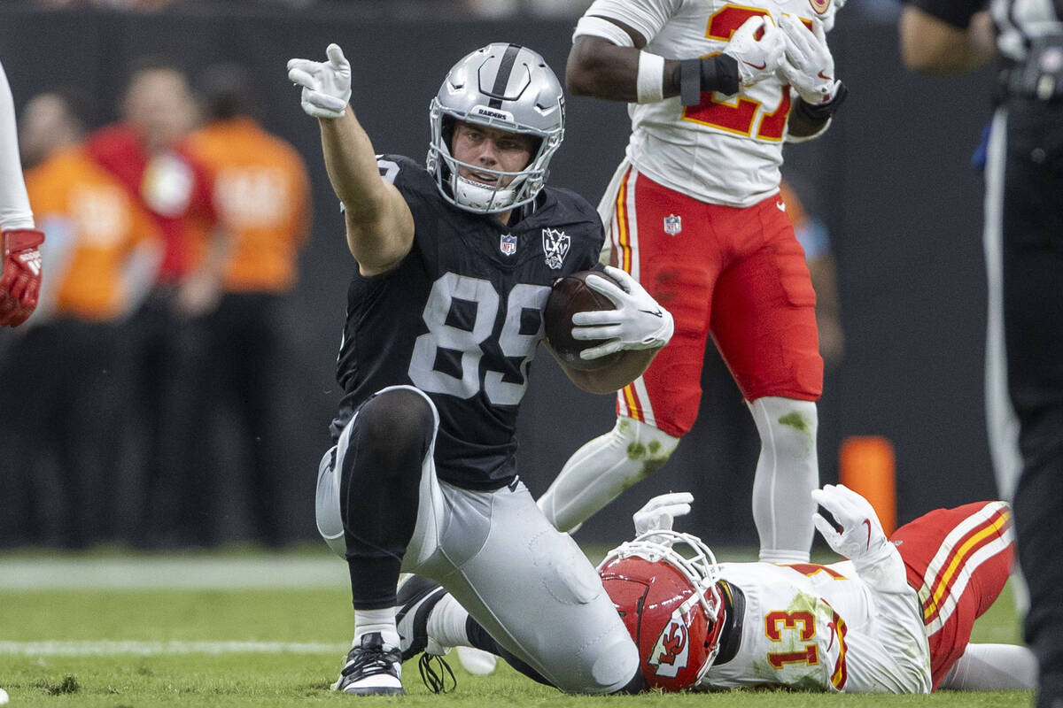 Raiders tight end Brock Bowers (89) signals for a first down against the Kansas City Chiefs dur ...