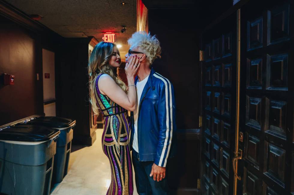 Murray Sawchuck, right, kisses his wife, Dani, before going on stage for his last headlining sh ...