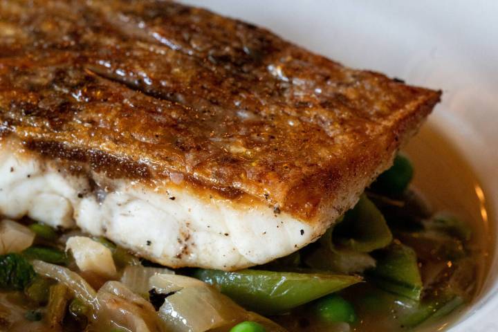 Striped bass from Gjelina, the famed Venice Beach, California, restaurant opening on Dec. 26, 2 ...