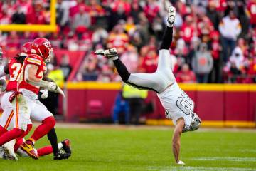 Las Vegas Raiders tight end Brock Bowers (89) hits the ground after catch against the Kansas Ci ...