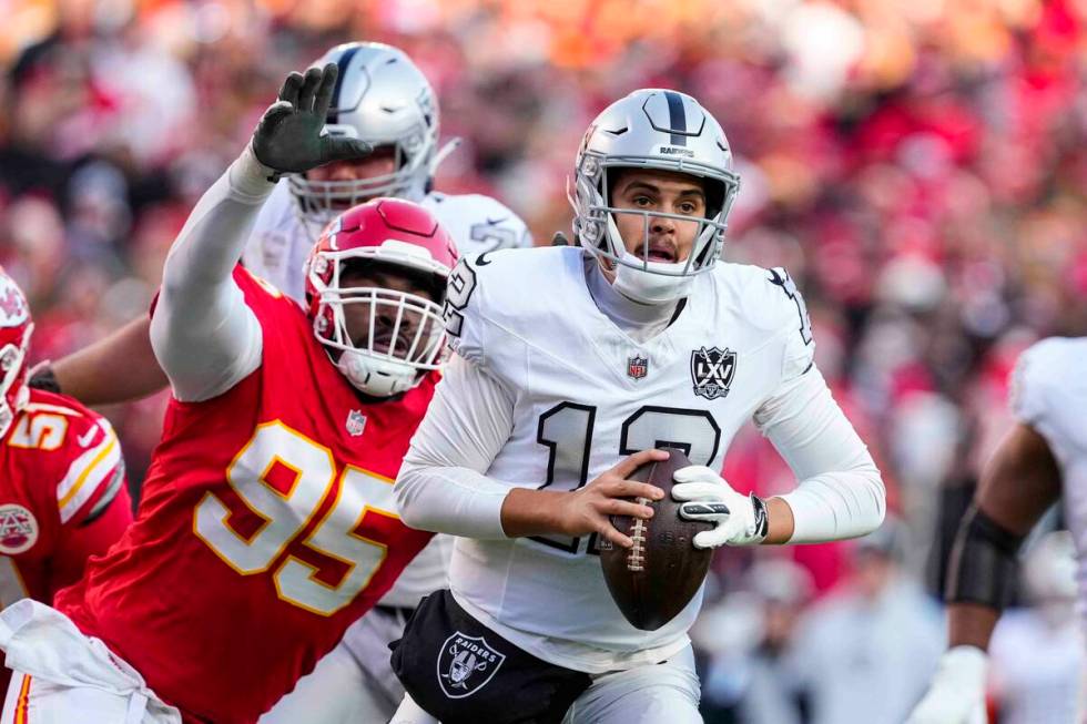 Kansas City Chiefs defensive tackle Chris Jones (95) pressures Las Vegas Raiders quarterback Ai ...