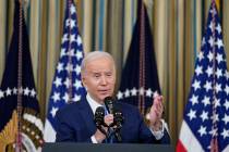 President Joe Biden speaks in the State Dining Room of the White House. (AP Photo/Susan Walsh, ...