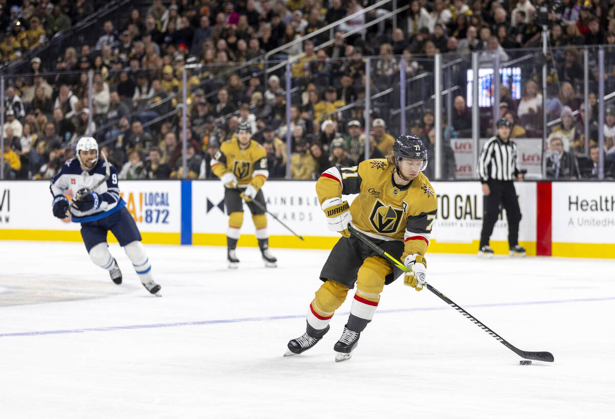 Golden Knights center William Karlsson (71) controls the puck during the NHL hockey game agains ...